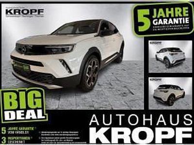 Gebraucht Opel Mokka-e Ultimate 100 kW (136 PS) 2023 Weiß (jade weiss/arktis weiss) SUV