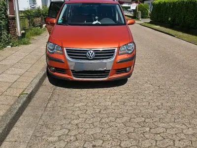 Używany VW Touran Cross 140 KM (102 kW) 2007 Pomarańczowy Minivan