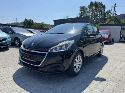 Gebraucht Peugeot 208 Active 82 PS (60 kW) 2015 Lackierung schwarz perla nera Kleinwagen