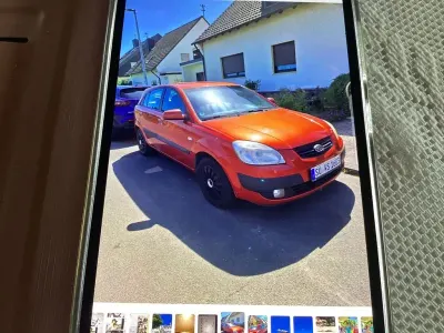 Gebraucht Kia Rio EX 110 PS (80 kW) 2008 Rot Limousine