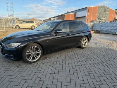 Gebraucht BMW 320 Sport Line 184 PS (135 kW) 2013 Schwarz Kombi