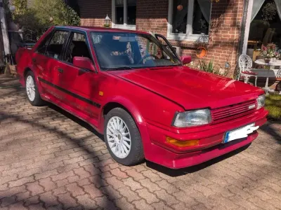 Gebraucht Nissan Bluebird 105 PS (77 kW) 1987 Rot Limousine