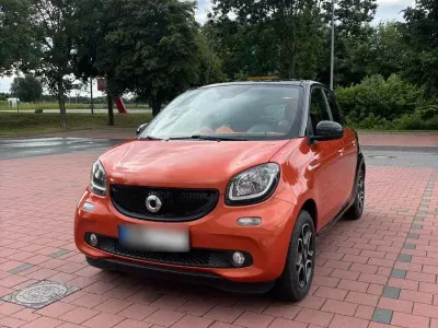 Gebraucht Smart ForFour Passion 71 PS (52 kW) 2015 Orange Kleinwagen
