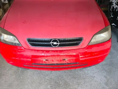 Używany Opel Astra 116 KM (85 kW) 2000 Czerwony Coupe