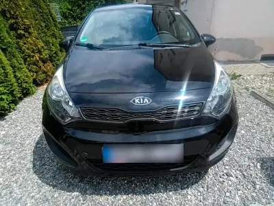 Gebraucht Kia Rio 109 PS (80 kW) 2012 Schwarz Kleinwagen