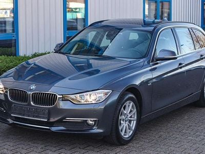 Second-hand BMW 320 Luxury Line 184 CP (135 kW) 2014 Gri Break