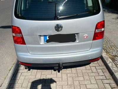 Second-hand VW Touran United 80 CP (58 kW) 2009 Argintiu Monovolum