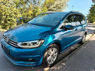 Gebraucht VW Touran Highline 150 PS (110 kW) 2023 Blau Van / Kleinbus