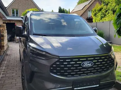 Gebraucht Ford Tourneo Custom Titanium X 170 PS (125 kW) 2025 Grau Van