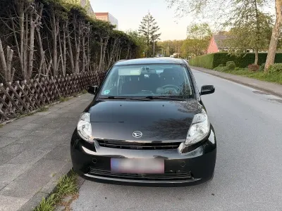 Gebraucht Daihatsu Sirion 89 PS (65 kW) 2007 Schwarz Kleinwagen