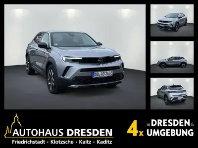 Gebraucht Opel Mokka Elegance 100 kW (136 PS) 2025 Kontrast grau SUV