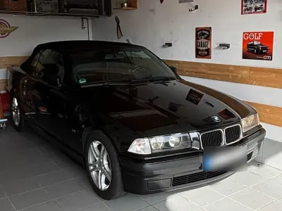 Gebraucht BMW 320 Cabriolet Basis 150 PS (110 kW) 1995 Schwarz Cabrio