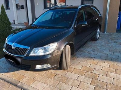 Second-hand Skoda Octavia Elegance 105 CP (77 kW) 2013 Negru Break
