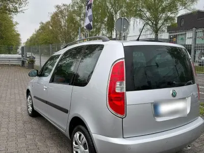 Second-hand Skoda Roomster Plus Edition 86 CP (63 kW) 2012 Argintiu Monovolum