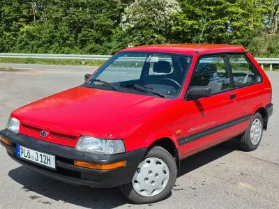 Gebraucht Subaru Justy 75 PS (55 kW) 1991 Rot Kleinwagen