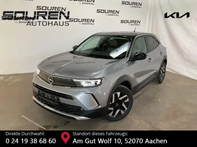 Gebraucht Opel Mokka Elegance 131 PS (96 kW) 2021 Kontrast grau/quarz silber SUV