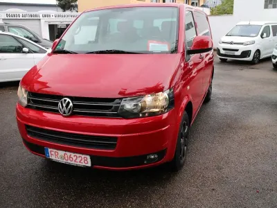Używany VW T5 140 KM (102 kW) 2013 Czerwony Van