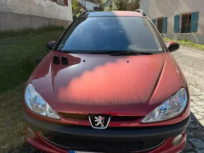 Używany Peugeot 206 108 KM (79 kW) 2012 Czerwony Kombi