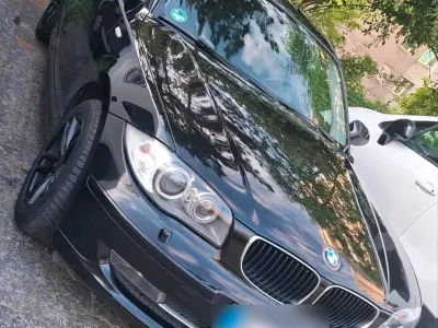 Gebraucht BMW 116 Sport Line 122 PS (89 kW) 2010 Schwarz Kleinwagen