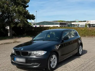 Second-hand BMW 116 116 CP (85 kW) 2011 Negru Hatchback