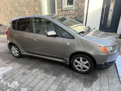 Gebraucht Mitsubishi Colt 95 PS (69 kW) 2012 Braun Kleinwagen
