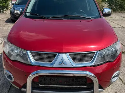 Begagnad Mitsubishi Outlander 156 HK (114 kW) 2009 Röd SUV