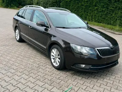 Używany Skoda Superb GreenLine 105 KM (77 kW) 2014 Brązowy Kombi