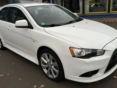 Gebraucht Mitsubishi Lancer 150 PS (110 kW) 2013 Weiß Limousine