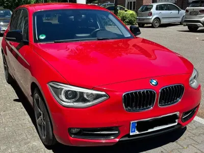 Gebraucht BMW 118 Sport Line 170 PS (125 kW) 2012 Rot Kleinwagen