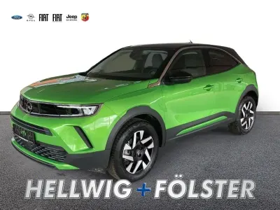 Gebraucht Opel Mokka-e Elegance 100 kW (136 PS) 2023 Matcha green/typ aussenverklei SUV