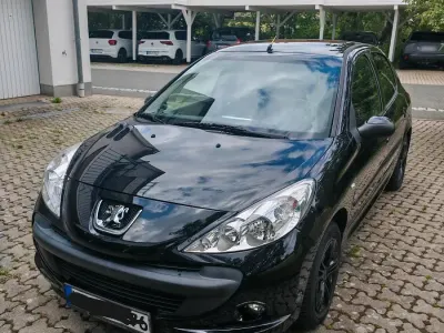 Gebraucht Peugeot 206+ 2012 Schwarz Kleinwagen