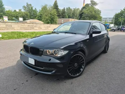 Gebraucht BMW 116 122 PS (89 kW) 2009 Schwarz Kleinwagen