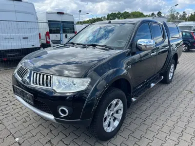 Używany Mitsubishi L200 178 KM (130 kW) 2012 Purpurowy Pickup