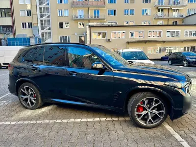 Używany BMW X5 Performance 489 KM (359 kW) 2024 Czarny SUV