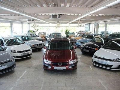 Second-hand Opel Omega 136 CP (100 kW) 1997 Roșu Berlinǎ