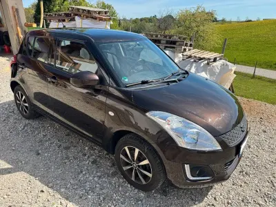 Usata Suzuki Swift Club 94 CV (69 kW) 2015 Marrone Utilitaria