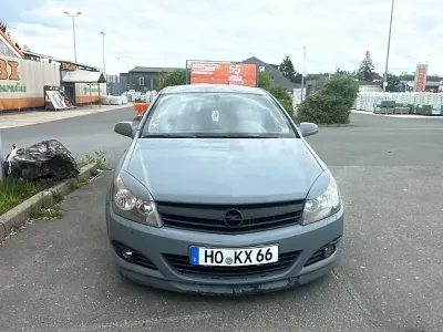 Używany Opel Astra 103 KM (75 kW) 2005 Szary Coupe