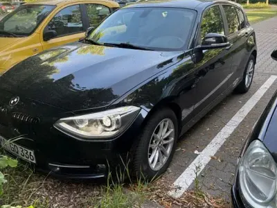 Gebraucht BMW 118 Sport Line 170 PS (125 kW) 2014 Schwarz Kleinwagen
