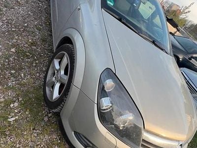 Second-hand Opel Astra GTC 170 CP (125 kW) 2006 Argintiu Hatchback