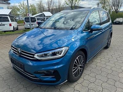 Second-hand VW Touran Highline 150 CP (110 kW) 2021 Albastru Monovolum