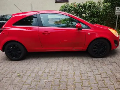Gebraucht Opel Corsa Selection 87 PS (63 kW) 2011 Rot Kleinwagen