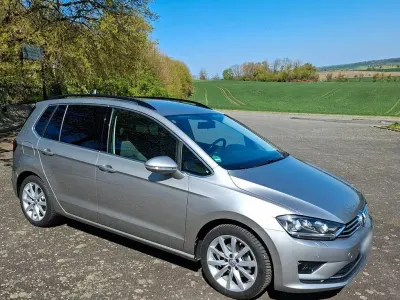 Second-hand VW Golf Sportsvan Highline 125 CP (91 kW) 2015 Argintiu Monovolum