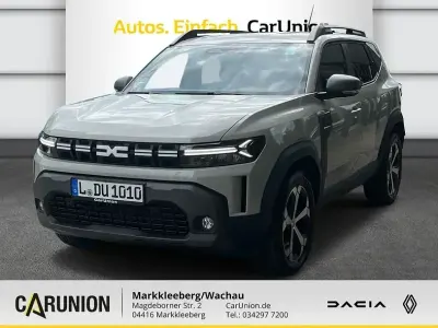 Używany Dacia Duster Journey 131 KM (96 kW) 2024 Beżowy SUV