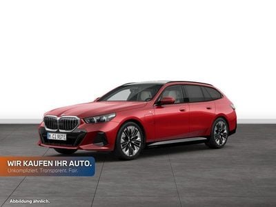 Gebraucht BMW 550e Comfort Edition 489 PS (359 kW) 2025 Fire red metallic Kombi