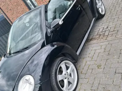 Gebraucht VW New Beetle 105 PS (77 kW) 2009 Schwarz Kleinwagen