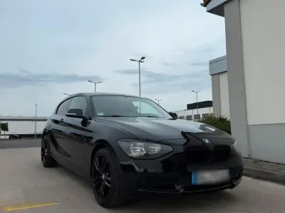Gebraucht BMW 116 Sport Line 136 PS (100 kW) 2012 Schwarz Kleinwagen