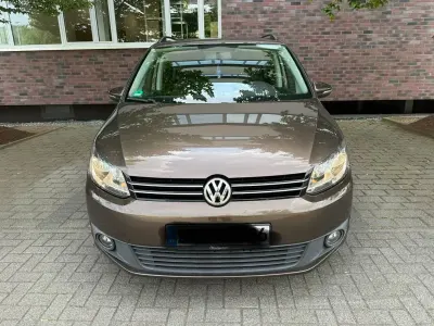 Gebraucht VW Touran 105 PS (77 kW) 2011 Braun Van / Kleinbus