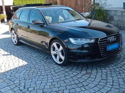 Używany Audi A6 Ambiente 320 KM (235 kW) 2015 Czarny Kombi