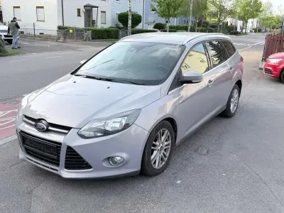 Gebraucht Ford Focus Titanium 140 PS (102 kW) 2013 Dark micastone Kombi