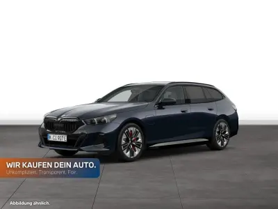 Gebraucht BMW 550e Comfort Edition 489 PS (359 kW) 2025 Carbonschwarz metallic Kombi
